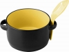 Black ceramic soup bowl with spoon